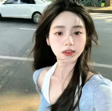梁女士